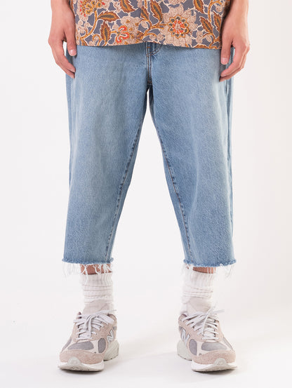 578™ バギージーンズ カプリ ミディアムインディゴ 